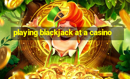 playing blackjack at a casino